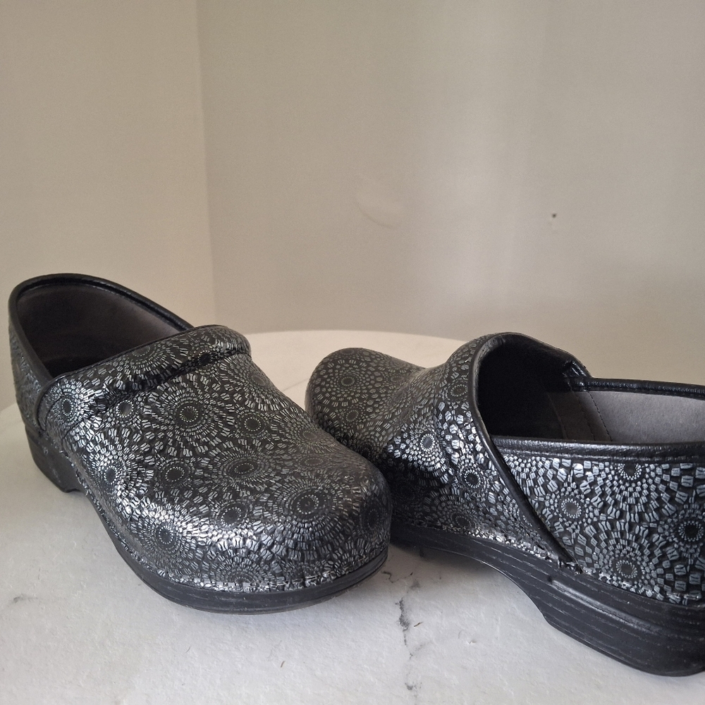 Dansko Black and Silver Patterned Clogs